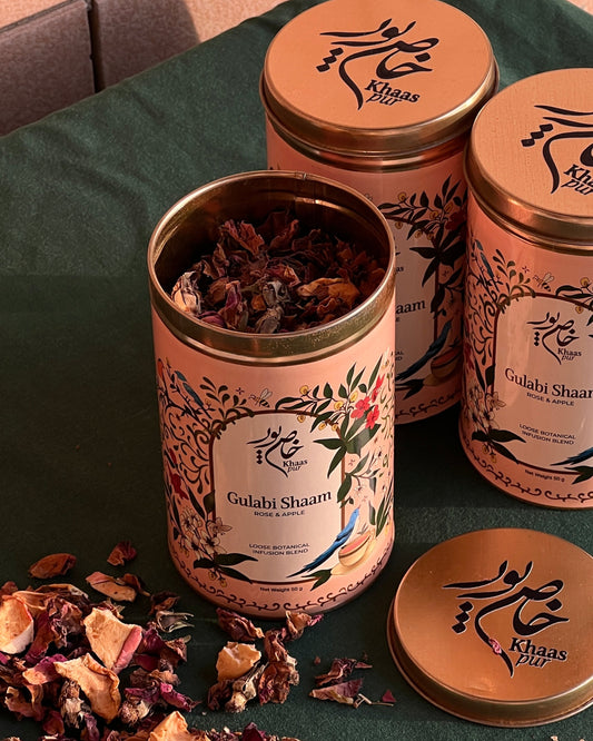 Open tin of Khaaspur Gulabi Shaam with rose and apple botanical blend
